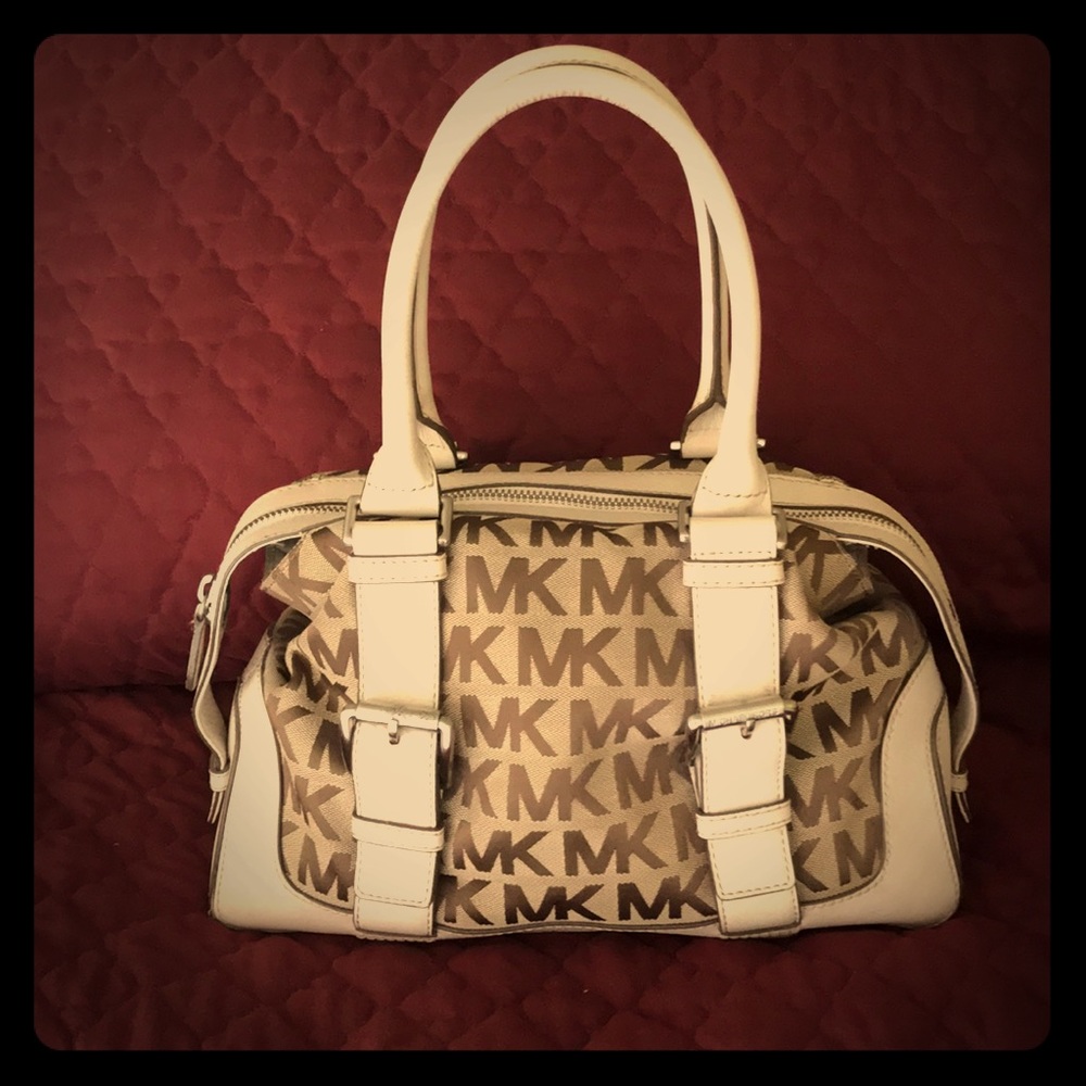 Michael Kors Cream leather trim with brown MK’s